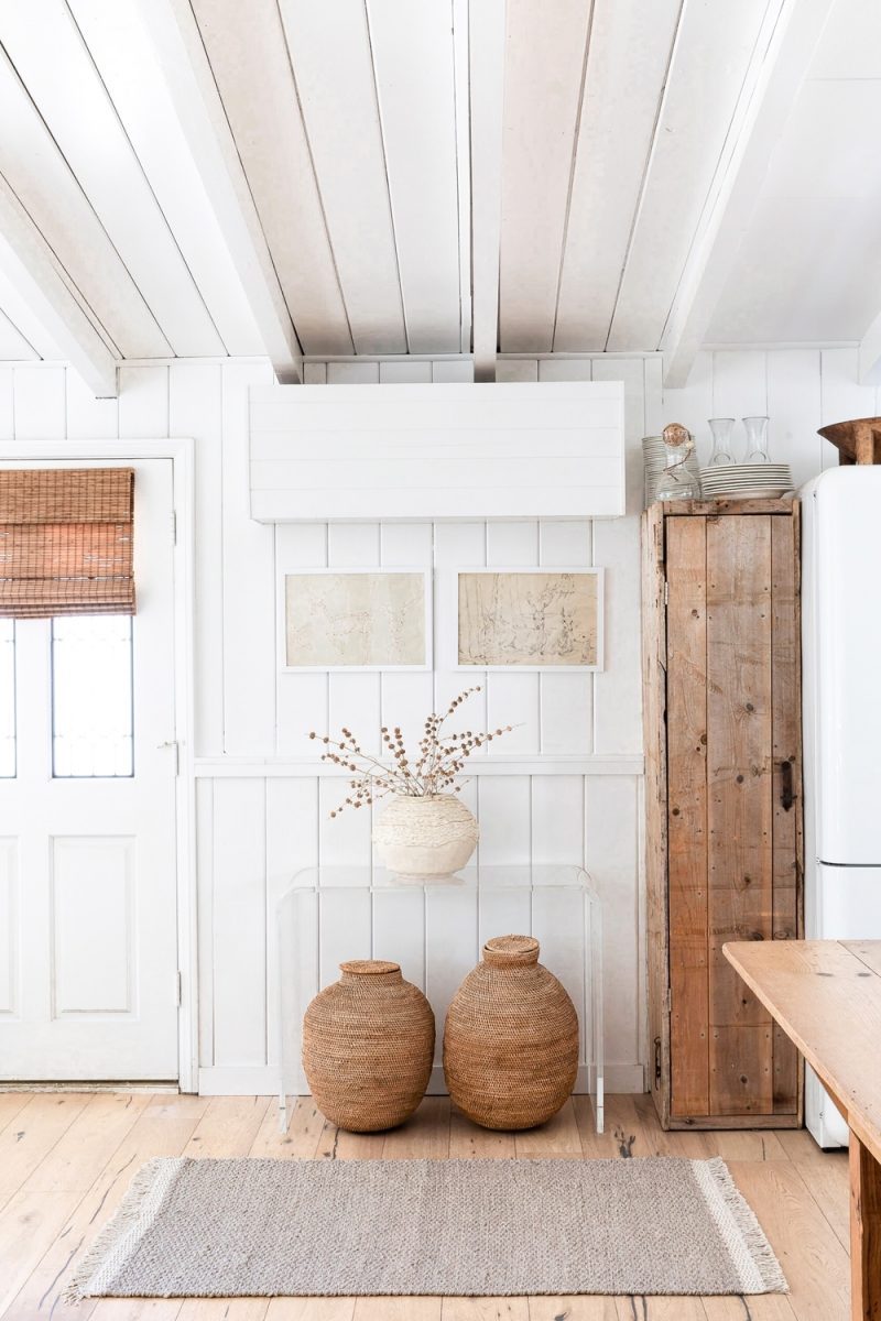 Rustic white organic and natural kitchen design with exposed rafters and an airy Cali vibe - Lulu and Georgia. #rustickitchen #kitchendesign #modernfarmhouse #organic #modernrustic