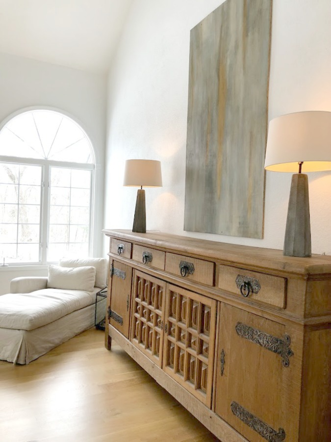 Antique Belgian sideboard and Belgian linen chaise in our living room - Hello Lovely Studio. #belgianstyle #sideboard #livingroom #interiordesign