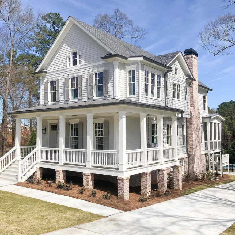 Repose Gray (Sherwin-Williams) paint color on house exterior with trim painted Alabaster White and shutters/door Dorian Gray - @bellsheepstudio.