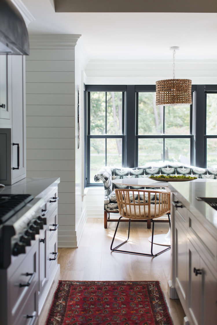 Timeless, traditional, and classic, this black and white modern farmhouse kitchen by Edward Deegan feels approachable yet luxurious. #modernfarmhouse #interiordesign #blackandwhite #kitchendesign