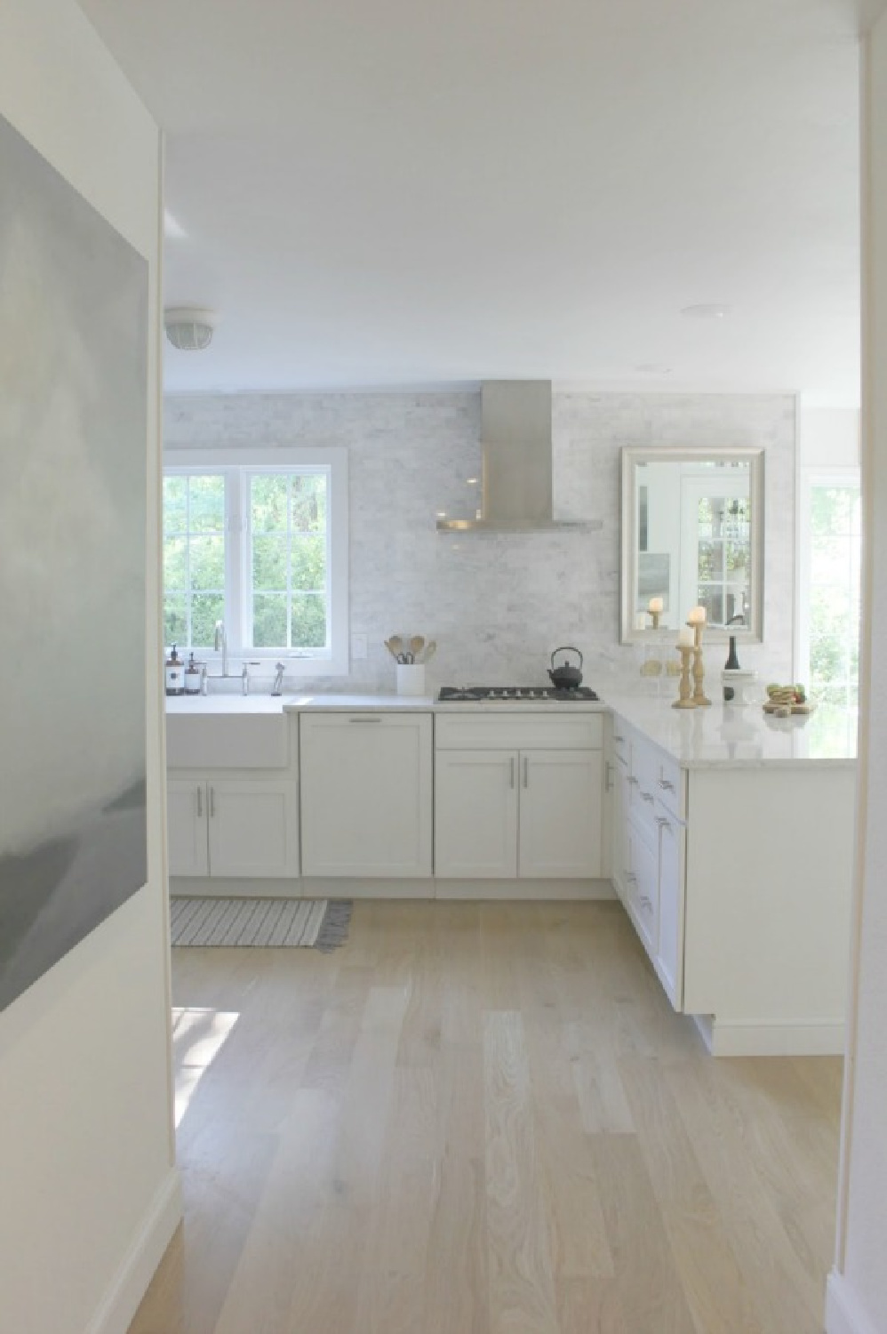 Classic white kitchen with fireclay farm sink - Hello Lovely Studio. #farmsink #classickitchen #kitchendesign #fireclaysink