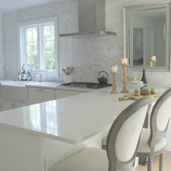Classic white kitchen with fireclay farm sink - Hello Lovely Studio. #farmsink #classickitchen #kitchendesign #fireclaysink
