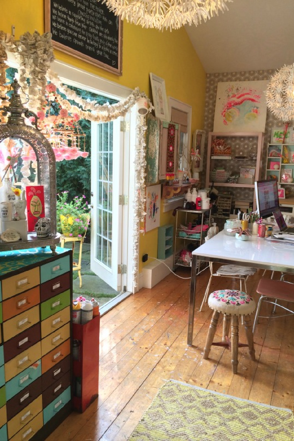 Cheerful and colorful art studio of Jenny Sweeney with flea market style and wild whimsy.