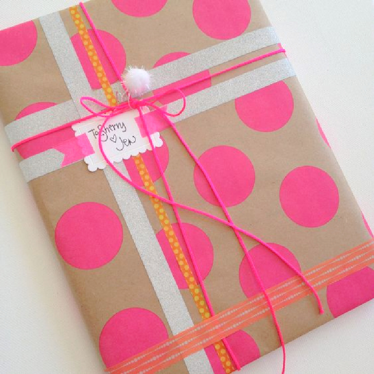 Whimsical gift wrap with washi tape and hot pink dots and kraft paper - Jenny Sweeney.