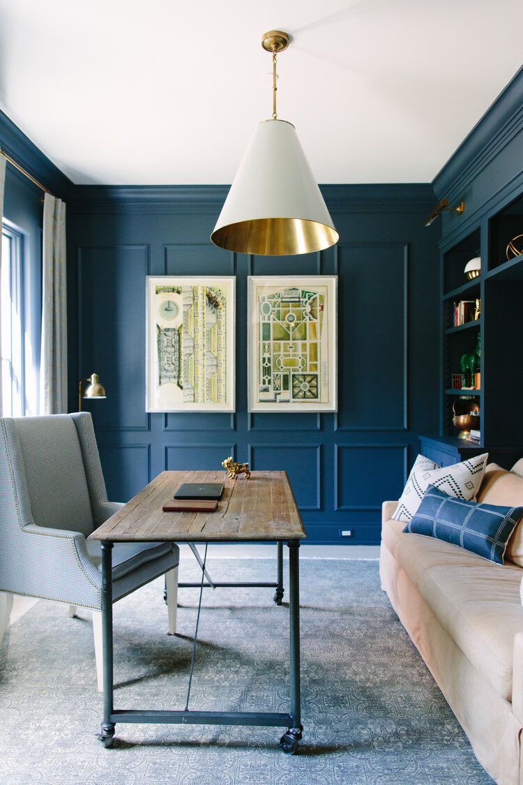 Rich and moody blue walls in an office/study with design by Kate Marker in Barrington, IL. Come enjoy encouraging love quotes and timeless decor inspiration! #modernfarmhouse #bluewalls #office