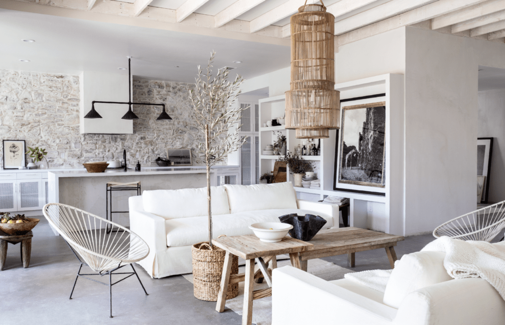 Leanne Ford's rustic warm minimal white great room for HGTV's Rock the Block. #leanneford #modernrustic #interiordesign #warmminimal #roughluxe #vintageboho