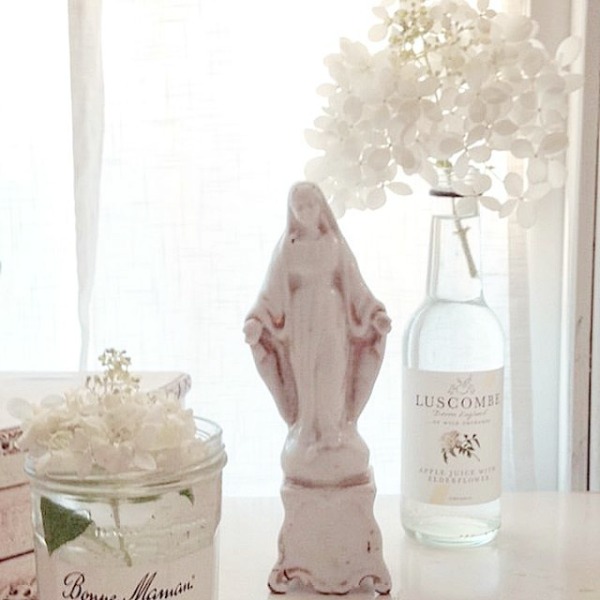 Gentle white on white shabby chic decor scheme in a Nordic French interior by My Petite Maison. #whitedecor #toneontone #swedishdecor #nordicfrench #whitecountrydecor #interiordesign