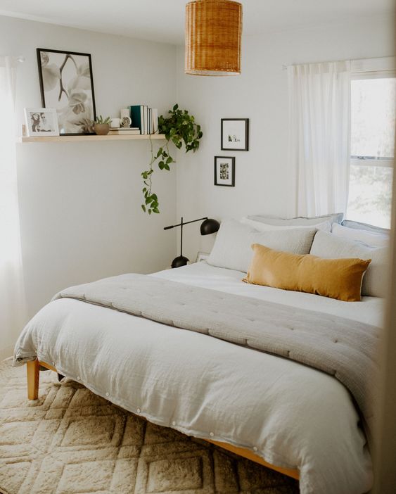 Neutral cozy bedroom with linen duvet set and cognac hued pillow - Parchute Home. #cozybedroom #bedroomdecor #linenbedding #interiordesign