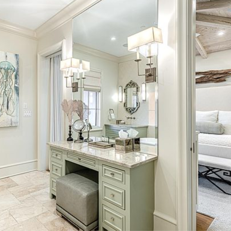 Luxurious bathroom with French country style and makeup vanity in Inlet Beach, FL. #bathroomdesign #makeupvanity