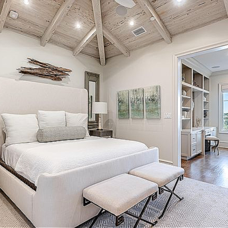 Relaxing coastal retreat bedroom with dramatic rustic wood ceiling in Inlet Beach, FL. #coastalbedroom #woodceiling