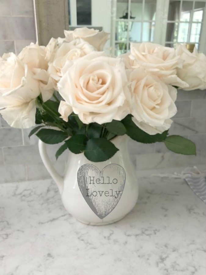 Ironstone pitcher of blush pink roses on kitchen counter (Viatera quartz - Minuet) - Hello Lovely Studio. #viatera #minuet