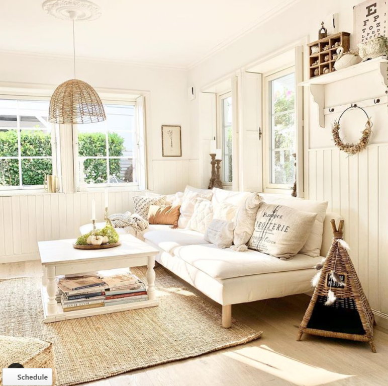 White on white Scandi living room with modern sofa, jute rug and neutrals - Villa Jenal.