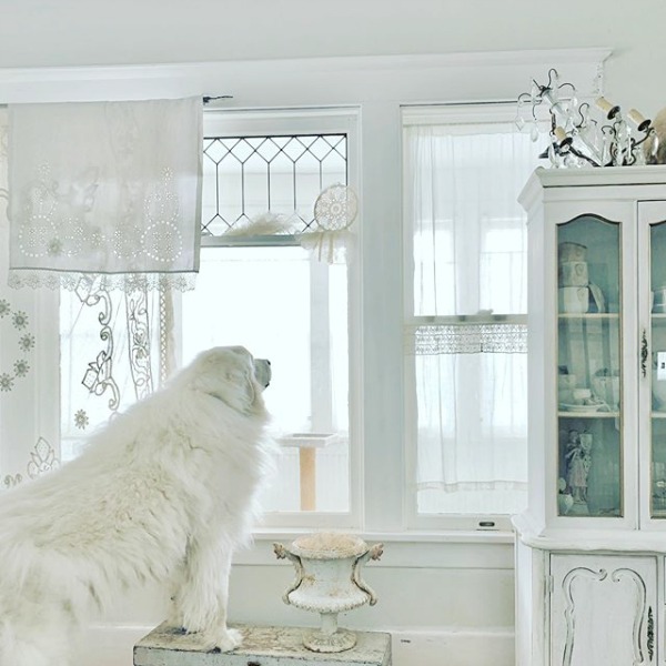 Gentle white on white decor scheme in a Nordic French interior by My Petite Maison.  Come see White & Rustic Country Interiors: 19 Ideas to Add Whimsy. #whitedecor #toneontone #swedishdecor #nordicfrench #whitecountrydecor #interiordesign