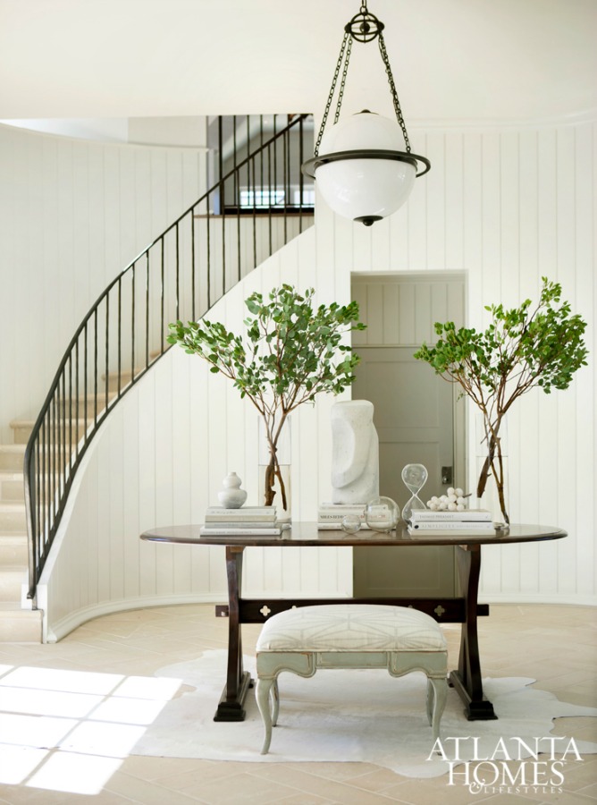 Magnificent entry and staircase in the home of architect Michael Ladisic - design by Sherry Hart. #entry #interiordesign #neutraldecor