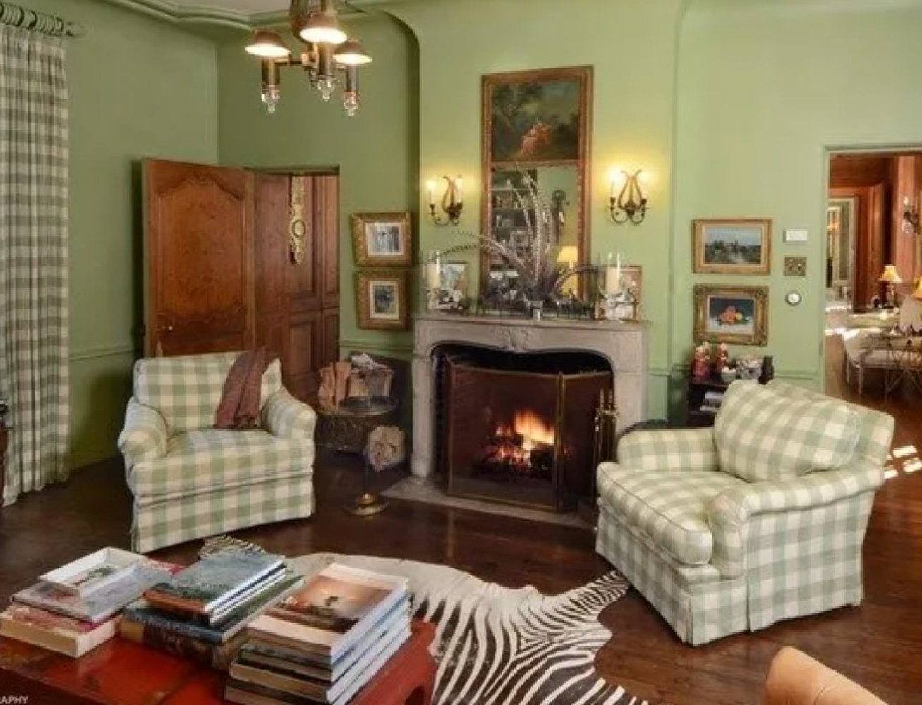 Light green on walls and check furnishings. David Adler La Lanterne Mansion is a 1922 historic home in Lake Bluff with French inspired architecture and interiors.