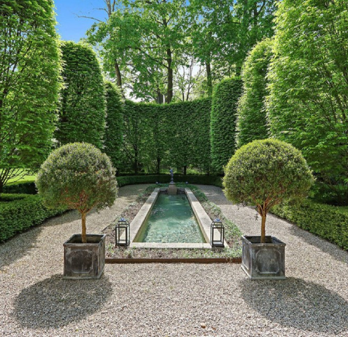 Gardens and pool. David Adler La Lanterne Mansion is a 1922 historic home in Lake Bluff with French inspired architecture and interiors.