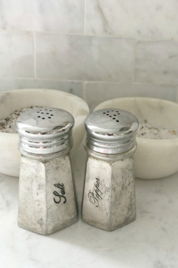 Antiqued silver salt and pepper shakers on my kitchen counter (Viatera Minuet quartz). #hellolovelystudio #antiquedsilver #kitchendecor #viateraquartz #minuet