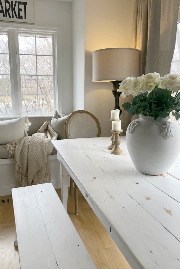 My simple white Shaker kitchen with white oak floors, marble subway backsplash, Viatera quartz "Minuet" counters, and a window seat. #hellolovelystudio #whiteshakerkitchen #kitchendesign #kitchendecor #classickitchen #viateraquartz #minuet