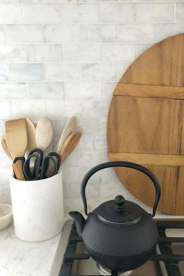 https://www.hellolovelystudio.com/wp-content/uploads/2020/03/hello-lovely-studio-kitchen-wood-marble-utensil-holder-black-teapot.jpg