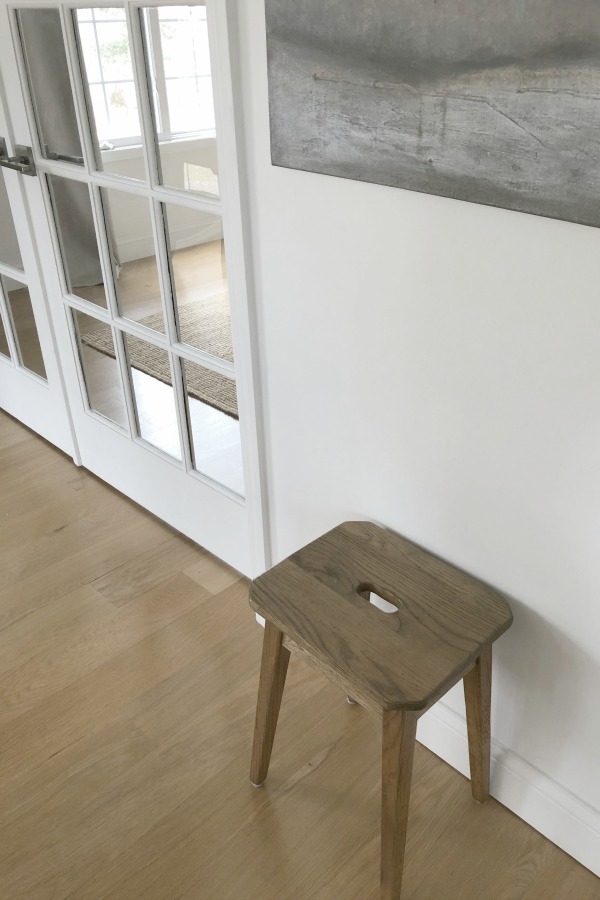 My simple white Shaker kitchen with white oak floors, marble subway backsplash, Viatera quartz "Minuet" counters, and a window seat. #hellolovelystudio #whiteshakerkitchen #kitchendesign #kitchendecor #classickitchen #viateraquartz #minuet