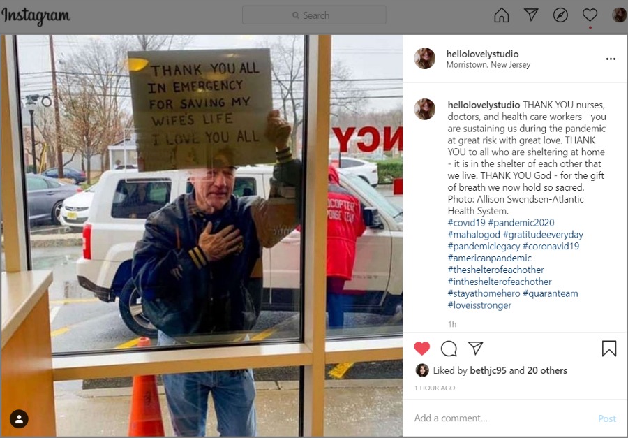 Heartwarming scene at hospital with husband in Morristown New Jersey holding sign thanking ER staff for saving his wife. Photo: Allison Swendsen of Atlantic Health System. #pandemicphoto #covid19photo #pandemic #americanpandemic