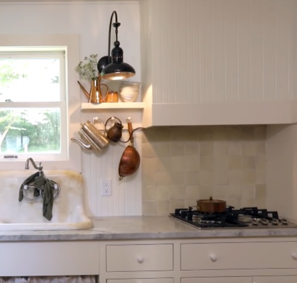 Zellige tile backsplash in a charming Shaker style kitchen in a cottage renovated on Restored by the Fords. #thesmithproject #leanneford #kitchendesign #rustickitchen #farmhousekitchen