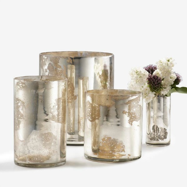 Set of varying sized mercury glass (or antiqued silver glass) cylinder vases or candle holders.