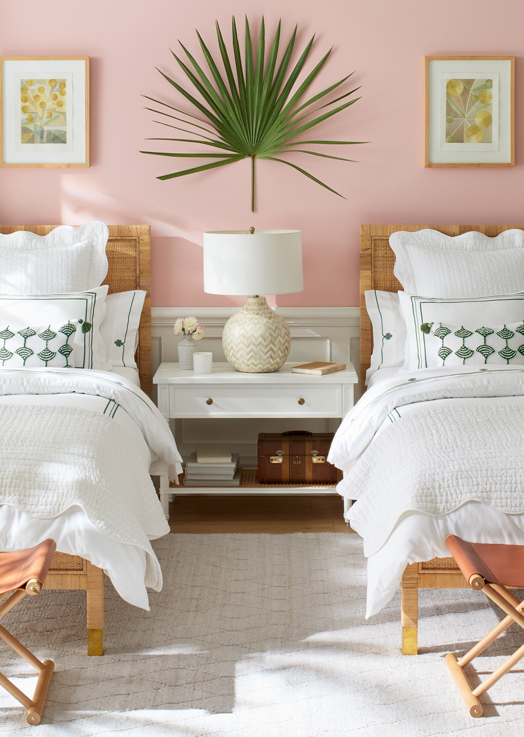 Pretty and classic coastal bedroom with candy pink wall, rattan beds, adn white bedding - Serena & Lily. #coastalcottage #bedroomfurniture #pinkbedrooms