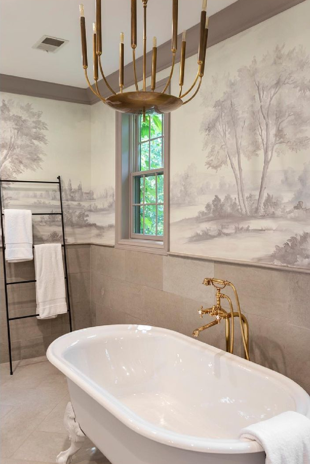 Susan Harter mural in a charming traditional bathroom with clawfoot tub - Erin Vondra Design. #susanharter #wallmural #muralwallpaper #bathroom