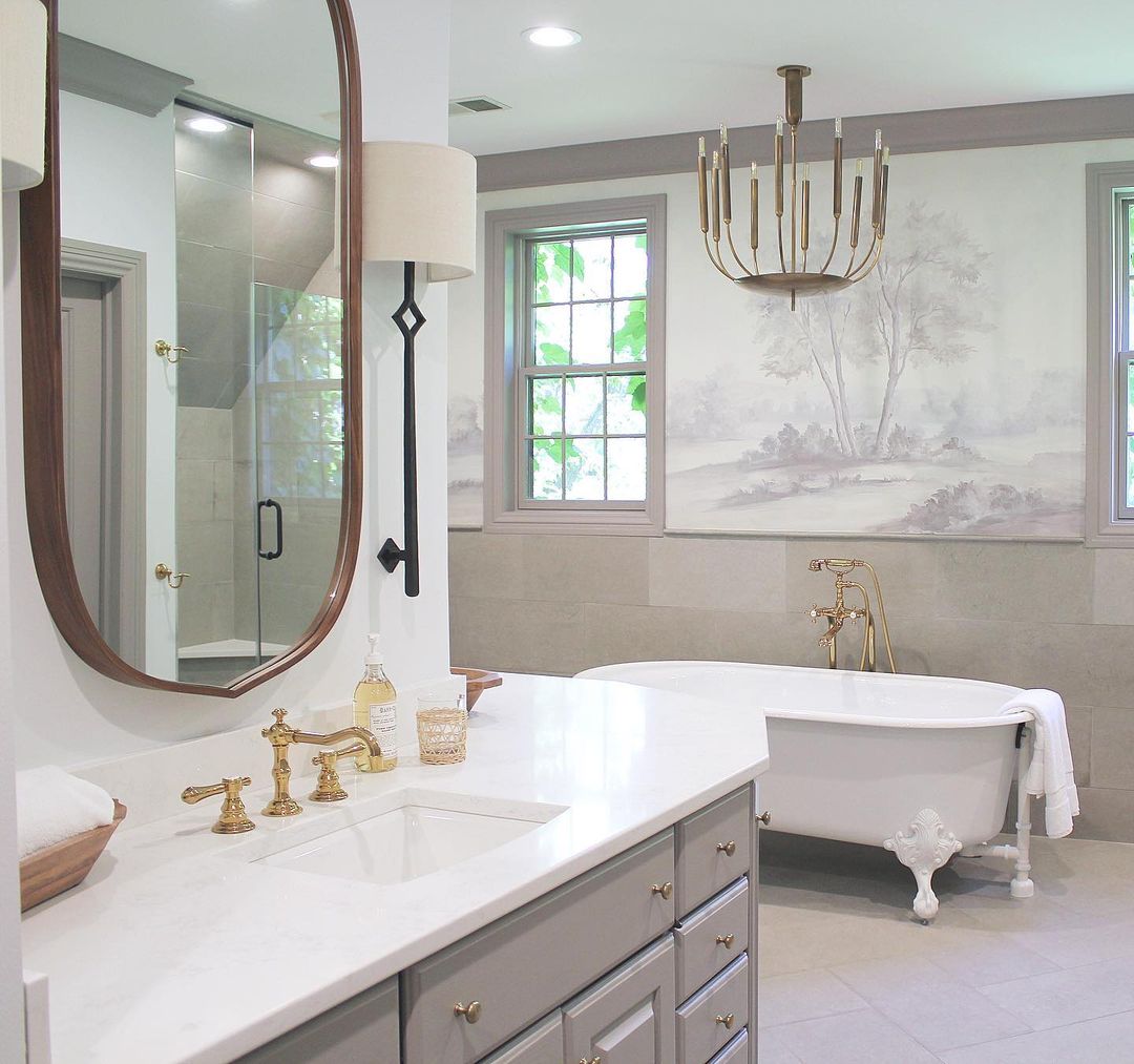 Susan Harter mural in a charming traditional bathroom with clawfoot tub - Erin Vondra Design. #susanharter #wallmural #muralwallpaper #bathroom