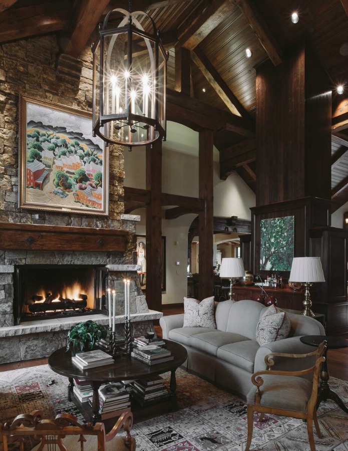 Handsome, rugged, and rustic yet sophisticated and luxurious, this Tom Stringer designed interior oozes comfort. #interiordesign #mountainlodge #luxuryhome #rusticluxe