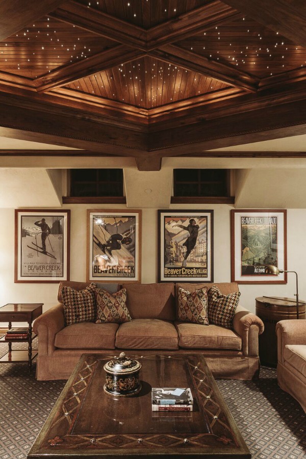 Handsome, rugged, and rustic yet sophisticated and luxurious, this Tom Stringer designed interior oozes comfort. #interiordesign #mountainlodge #luxuryhome #rusticluxe