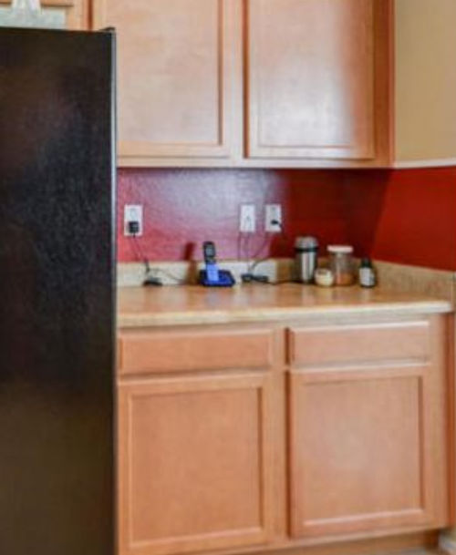 before photo of Arizona kitchen with red backsplash