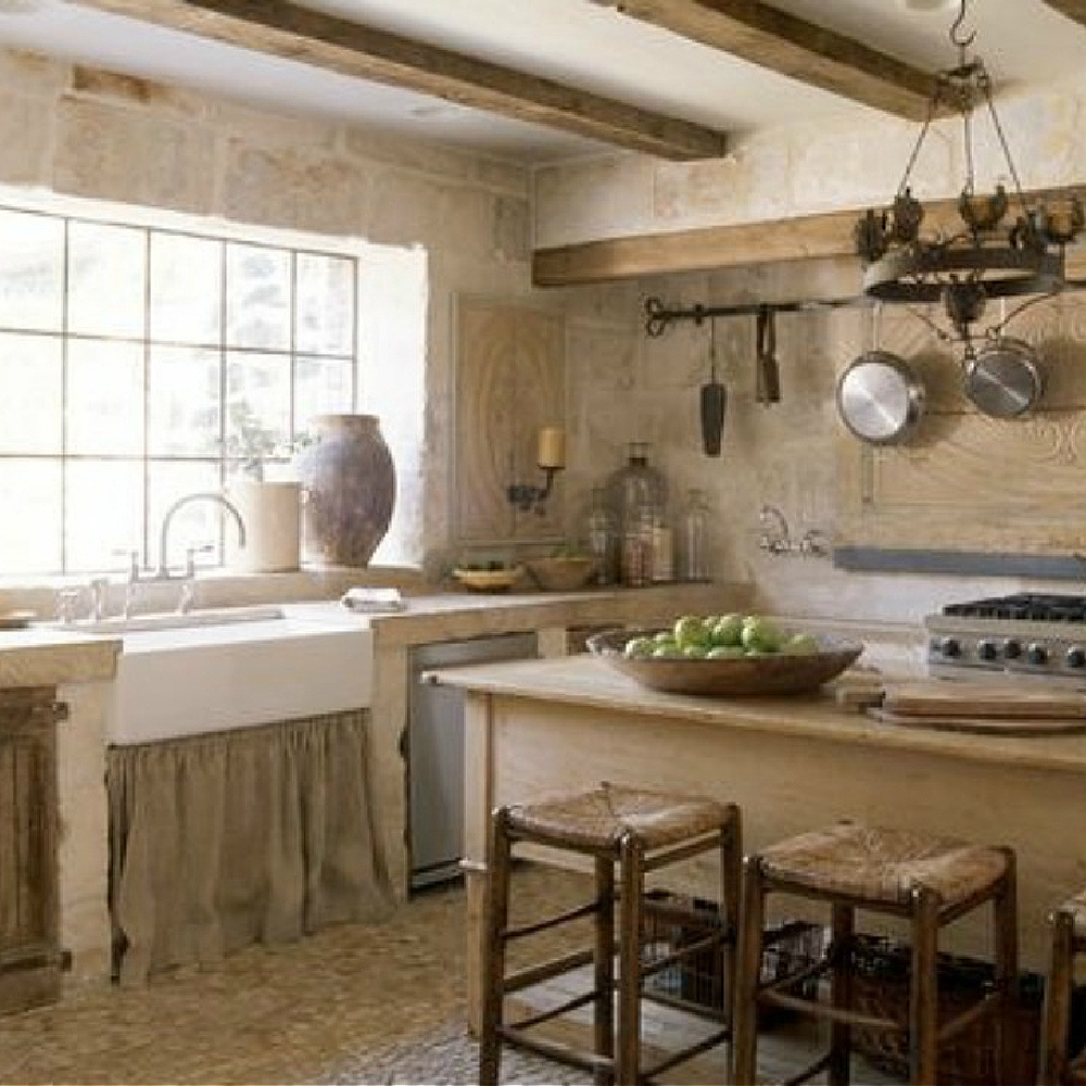 French farmhouse kitchen of Ruth Gay of Chateau Domingue. See more rustic elegant French farmhouse design ideas and decor inspiration. #frenchfarmhouse #interiordesign #frenchcountry