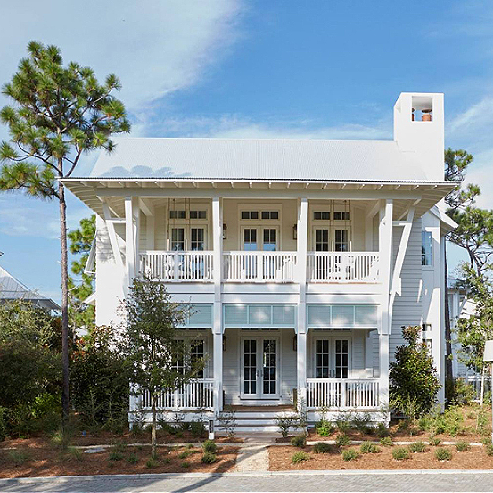 Magnificent exterior of a coastal home by Geoff Chick & Associates.Come discover  White Homes + A Few Bright White Exterior Paint Colors#coastalhome #coastalarchitecture #traditionalhome
