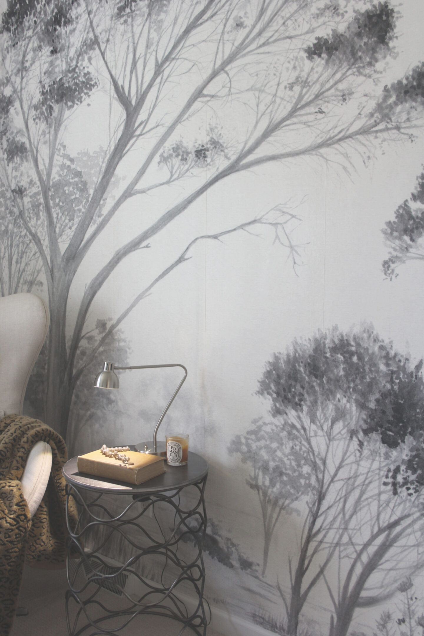 Lovely grisaille mural wallpaper from Photowall with grey trees on a white ground. I created a DIY accent wall in a guest bedroom, and the mood is timeless, serene and tranquil - Hello Lovely Studio. #wallpaper #mural #interiordesign #hellolovelystudio #grisaille #treewallpaper