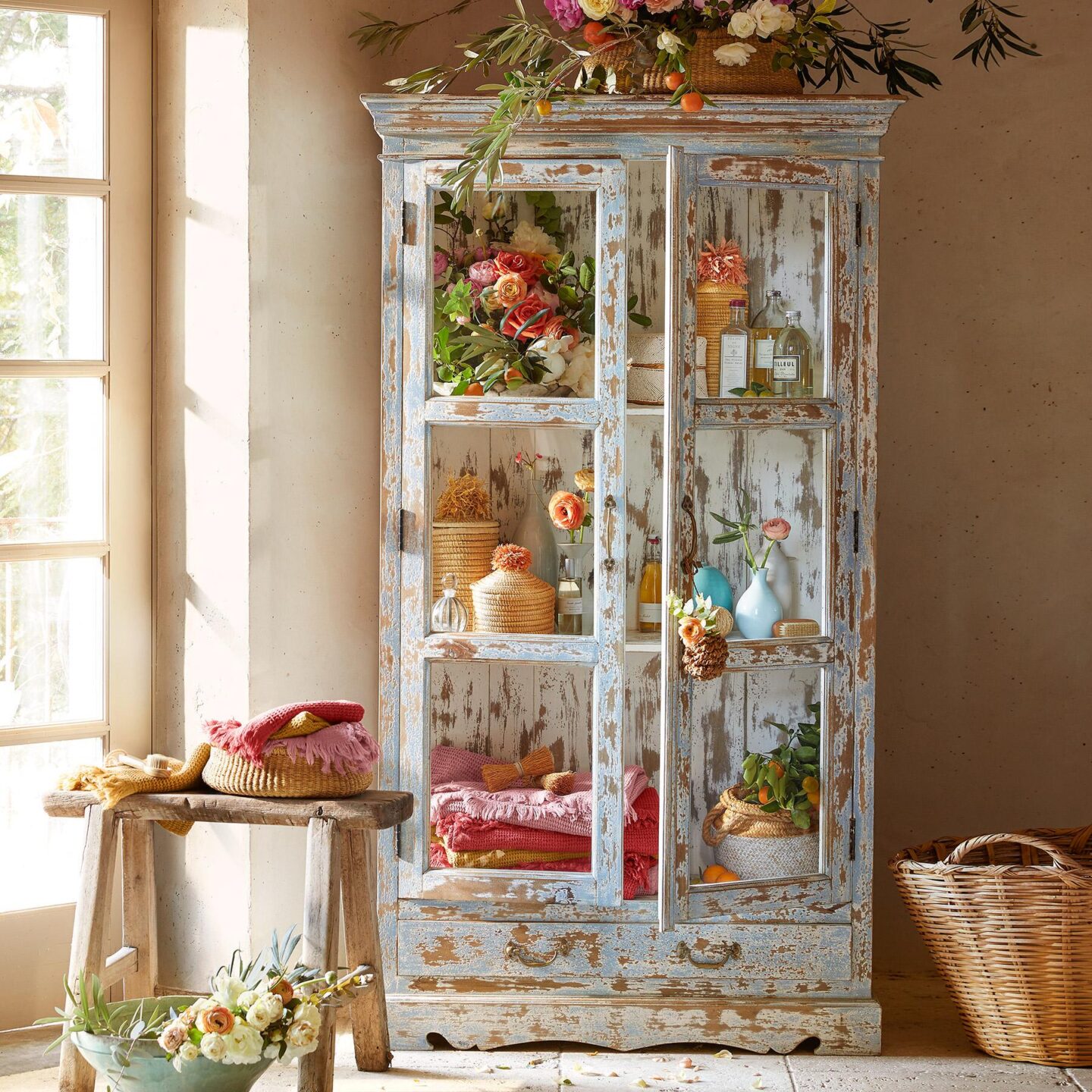 Beautiful painted vintage style glass door Maebel cabinet from Sundance catalog furniture. #maebelcabinet