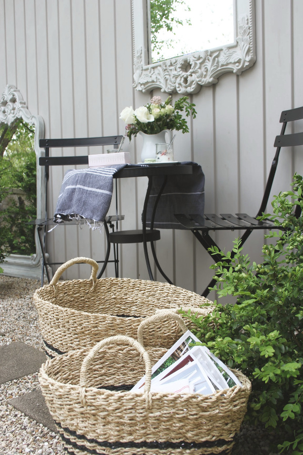 French country seagrass baskets with Frenchie black stripes are perfect for stowing summer essentials inside and out. #seagrassbaskets #frenchbaskets #homedecor #baskets #frenchcountrydecor #modernfrench #hellolovelystudio