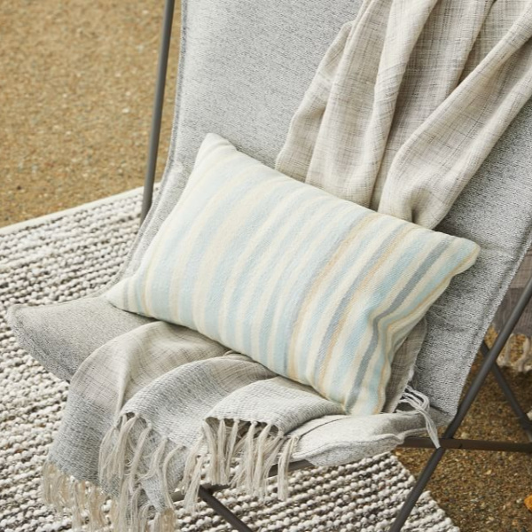 Butterfly chair with stripe pillow. Airstream at Pottery Barn