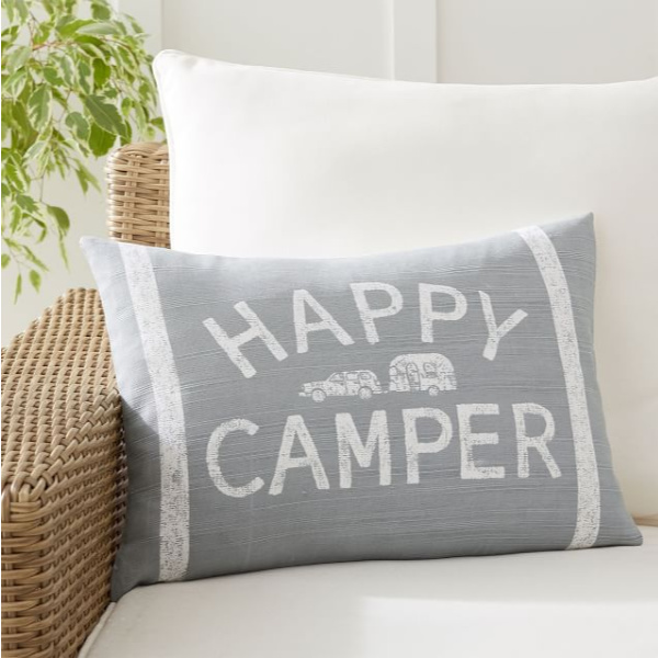 Happy Camper pillow. Airstream at Pottery Barn is a lovely collection of whimsical and happy camper decor whether we have a vintage camper to put in or not! #airstream #potterybarn #happycamper #whimsicalgifts #vintagecamper #homedecor