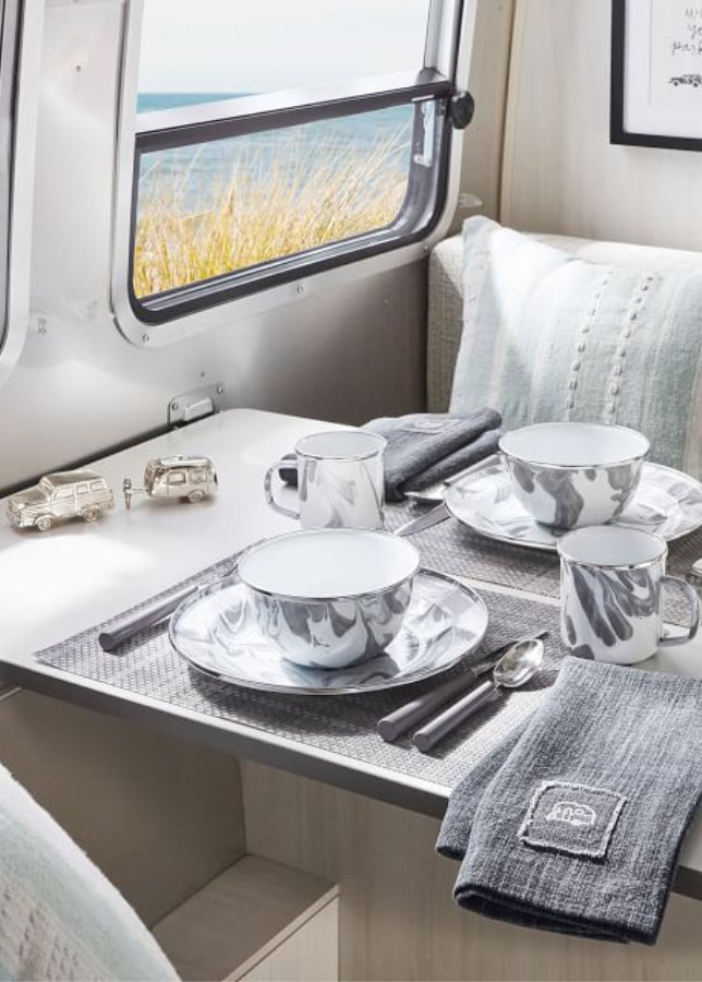 Marbled grey dishes. Airstream at Pottery Barn is a lovely collection of whimsical and happy camper decor whether we have a vintage camper to put in or not! #airstream #potterybarn #happycamper #whimsicalgifts #vintagecamper #homedecor