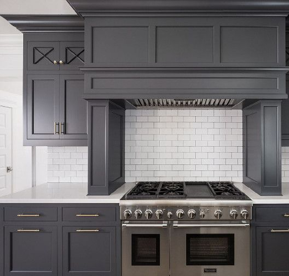 Grey and white classic timeless kitchen by The Fox Group. Come be inspired by more Timeless Interior Design Ideas, Paint Colors & Furniture. #thefoxgroup #benjaminmoorecheatingheart #kitchendesign #greycabinets #subwaytile #greyandwhitekitchen