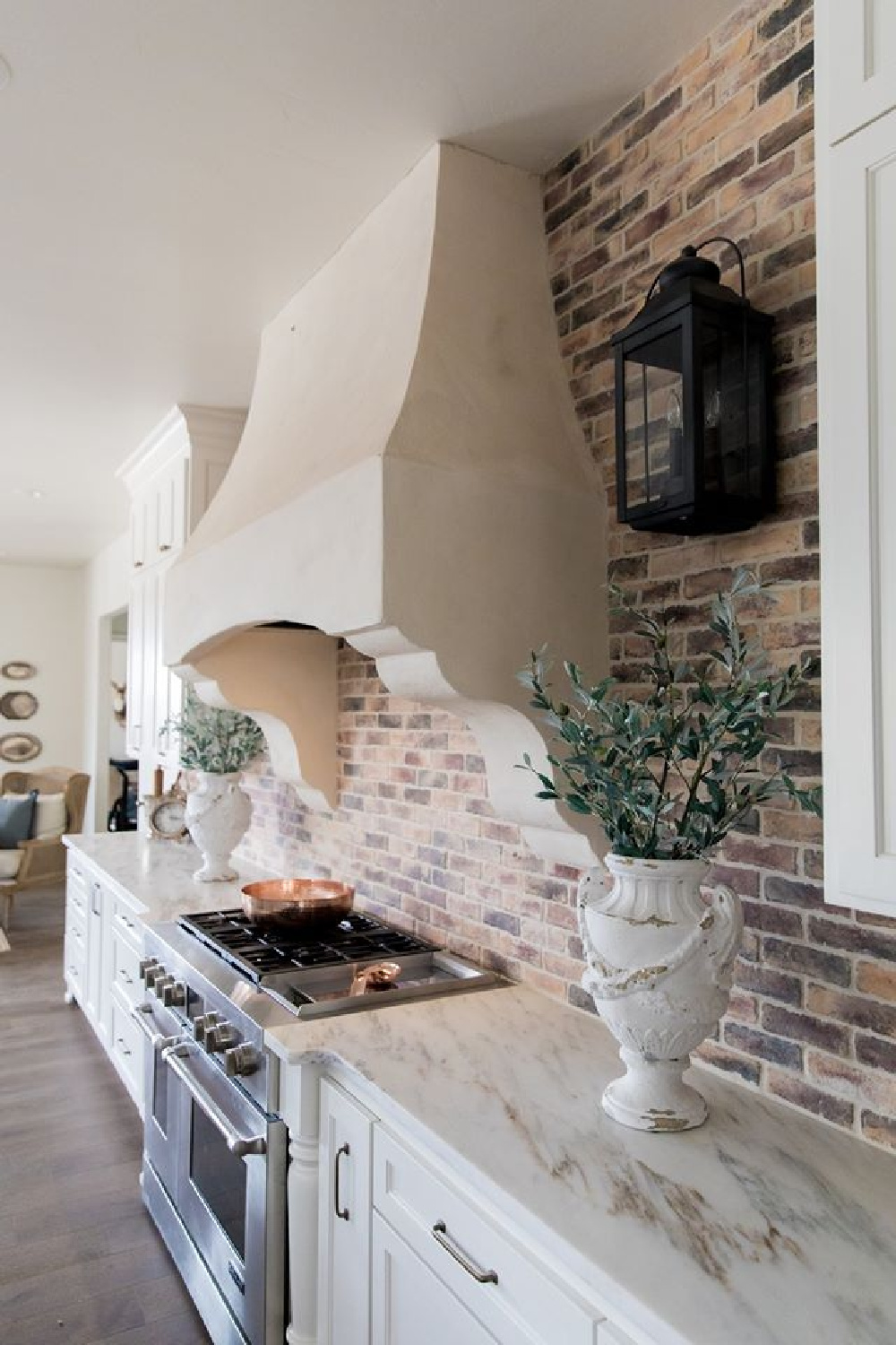 Beautiful brick backsplash in a French country kitchen in Texas - Brit Jones.
