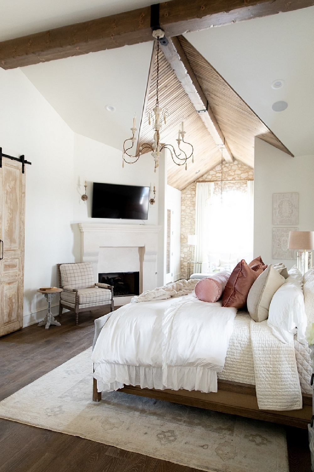 French country bedroom with wood ceiling detail - Brit Jones.