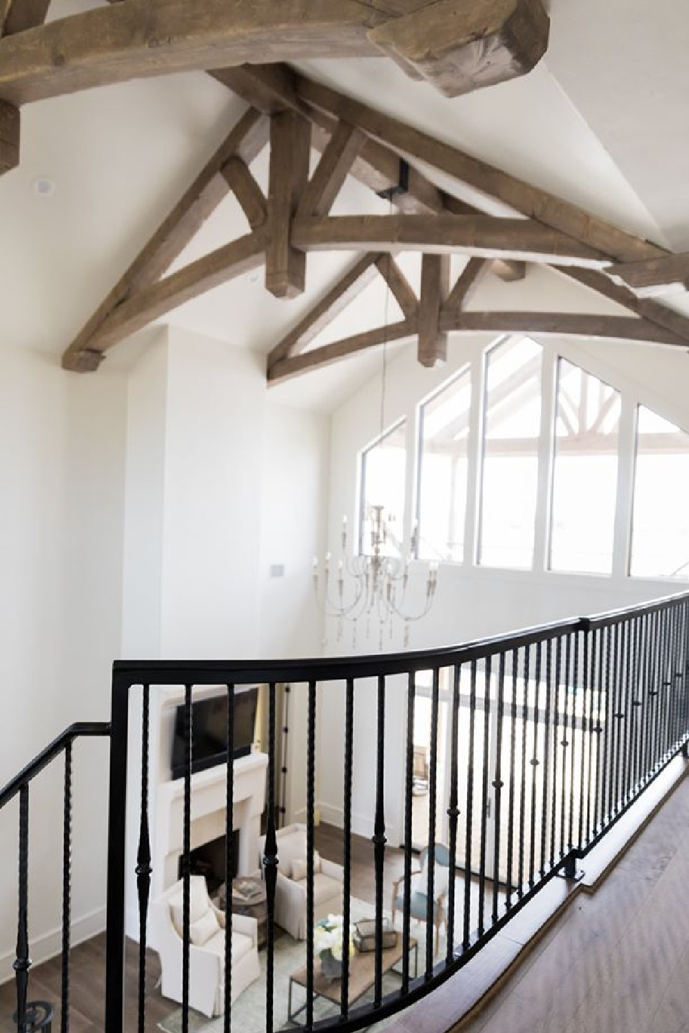 Lofty ceilings in a great room within a French country new build - Brit Jones.