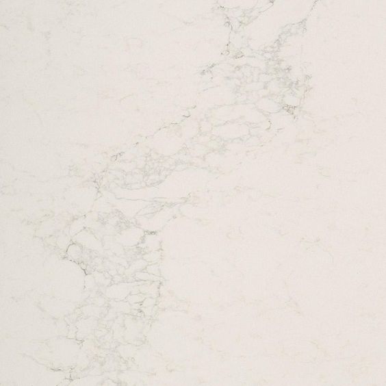Caesarstone Calacatta Nuvo - eine weiße Quarz-Arbeitsplatte für Küchen und Bäder. #caesarstone #calacattanuvo #whitequartz #kitchendesign #countertops