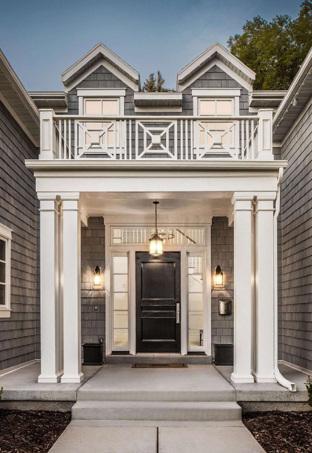 Beautiful architecture and portico railing inspiration from a home by The Fox Group. Come be inspired by more timeless design. #thefoxgroup #houseexterior #portico #architectureinspiration