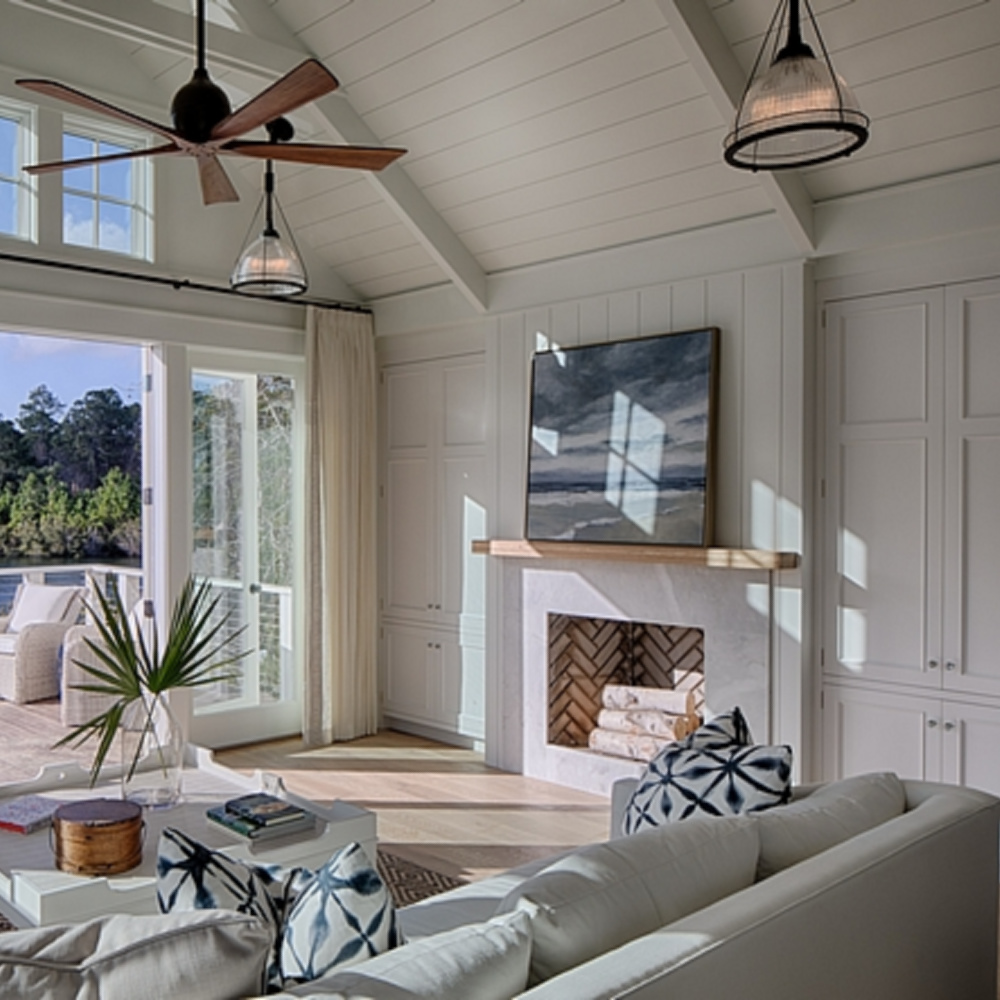 Beautiful classic coastal living room with casual modern farmhouse design and shiplap - Lisa Furey.