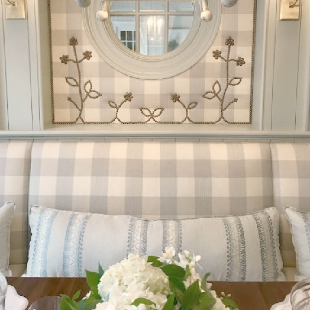 Lovely Cowtan & Tout fabrics in Buffalo check and light blue grace a traditional style dining area in the 2017 Southeastern Designer Showhouse. #diningroom #interiordesign #buffalocheck #traditionalstyle