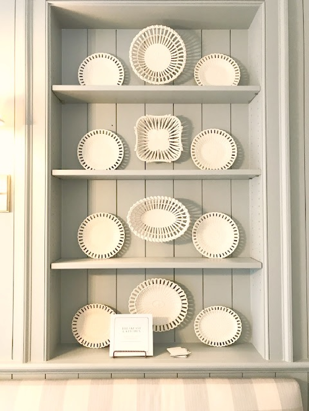 Lace creamware antique plates on blue painted shelves in traditional kitchen at Southeastern Designer Showhouse 2017. #farrowandballlightblue #diningroom #traditionalstyle #interiordesign